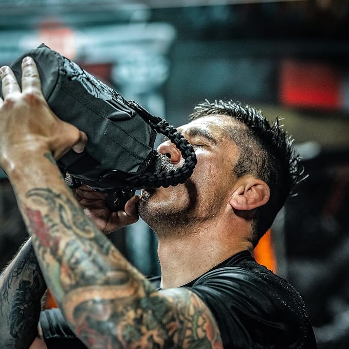 Iron Infidel Battle Bottle - Half Gallon Water Bottle Insulated, 64 oz Stainless Steel Water Jug with Handle - Gym Water Bottle for Men with Rugged Sleeve for Storage (Earned, Not Given 2 Liter)