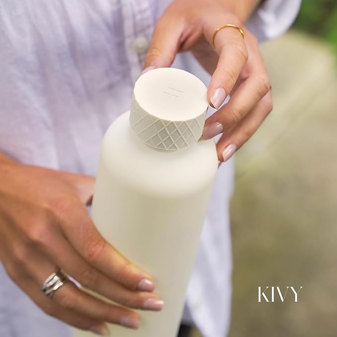KIVY Slim Water Bottle 22oz [Lightweight & Shatterproof] - Small Drinking Waterbottle - Clear Water Bottle Without Straw for School, Sport & Travel - Transparent Bottle Dishwasher Safe, BPA Free
