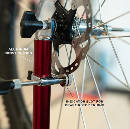 FEEDBACK SPORTS | Pro Truing Stand with Thru Axle Adapter | Compact and Portable Lightweight Aluminum | Integrates With Repair Stand | Precision Spring-Loaded Tip Verifies Lateral True